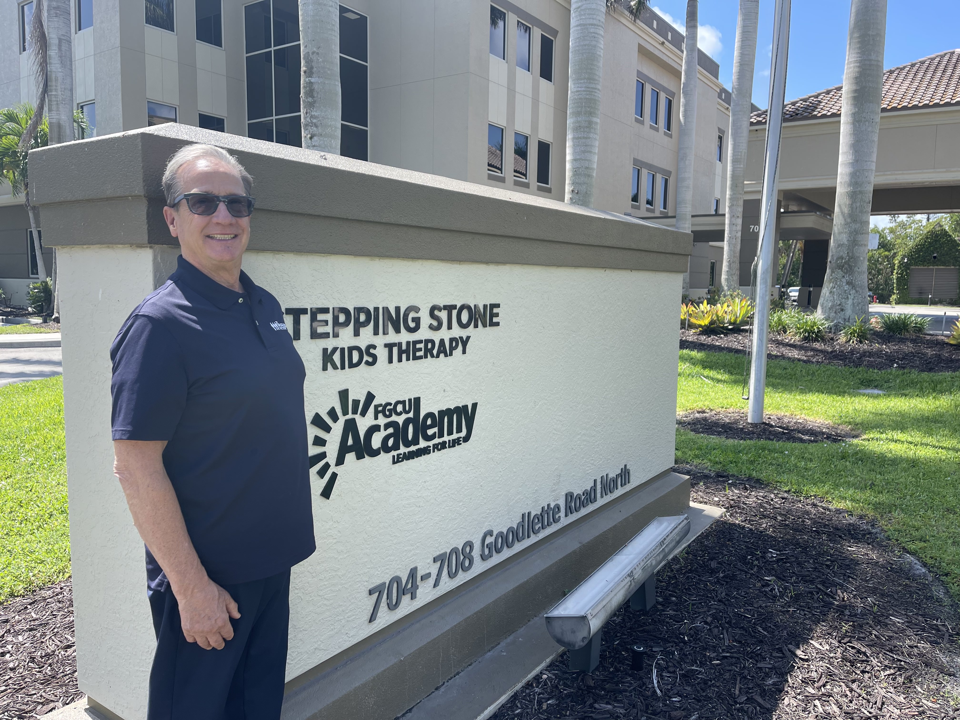 Dr. Bob in front of the Florida clinic